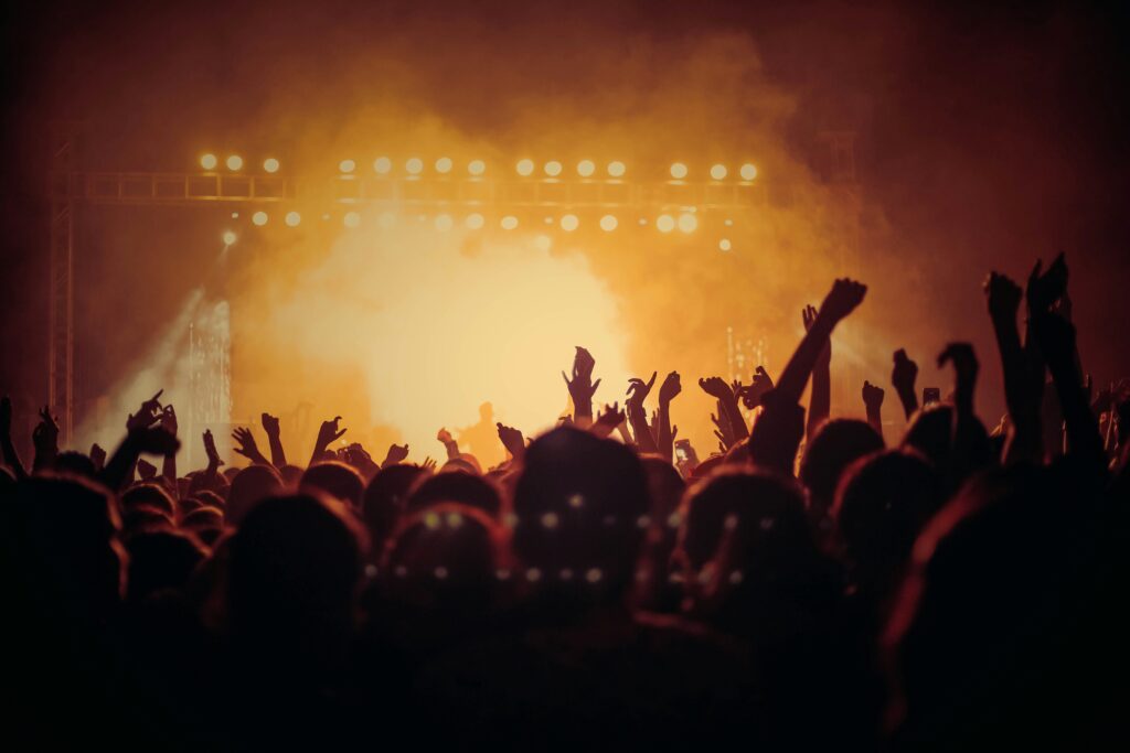concert crowd with neon lights