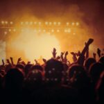 concert crowd with neon lights