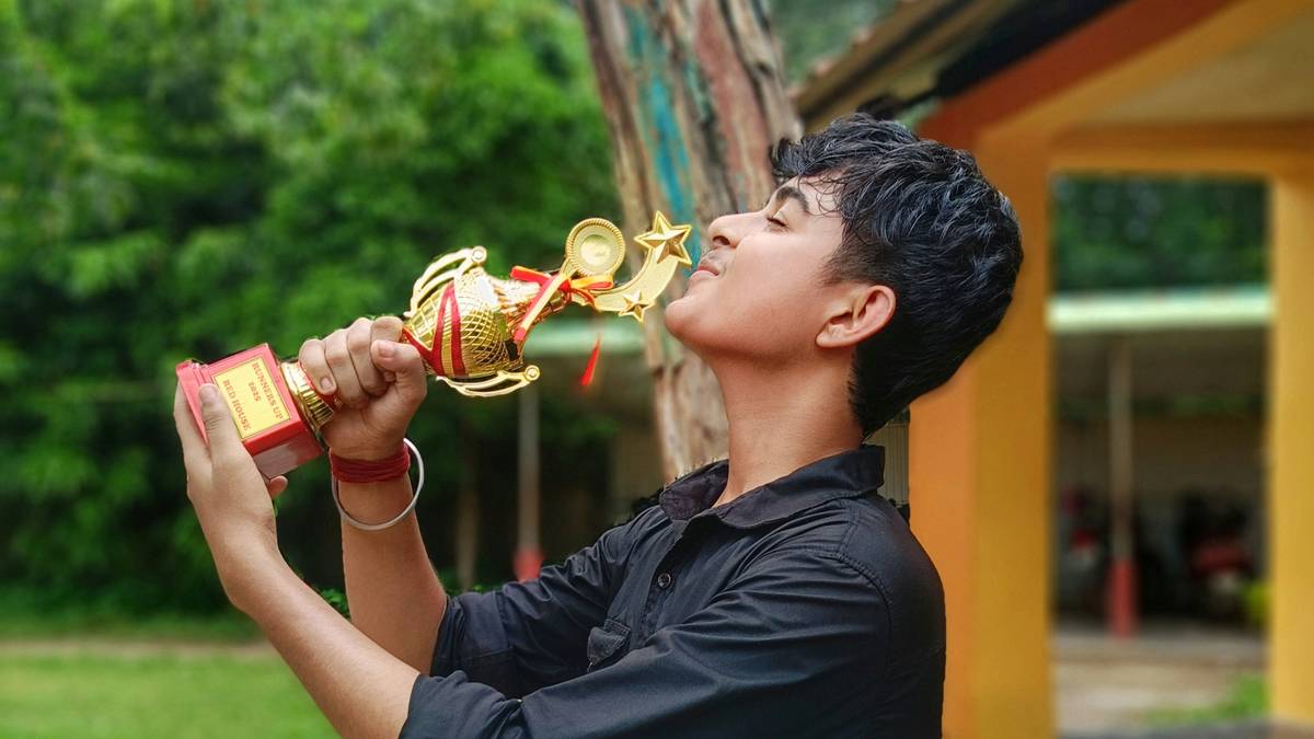 Bugha celebrating his Fortnite World Cup victory with his signature stylish skin.