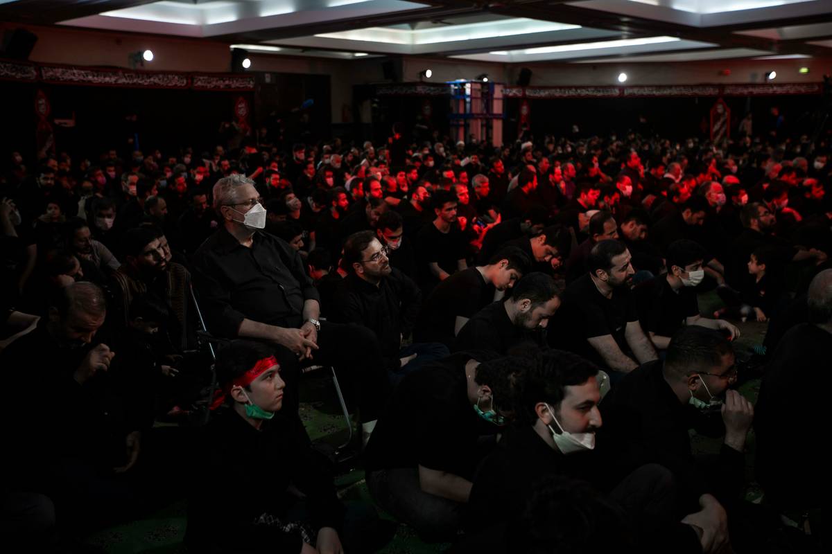 Crowd cheering at a Fortnite tournament